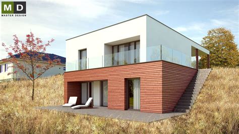 Moderní dům částečně zapuštěný do svahu s terasou