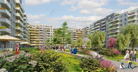 Panoramatický pohled na bytový komplex Hostivař s výhledem do údolí