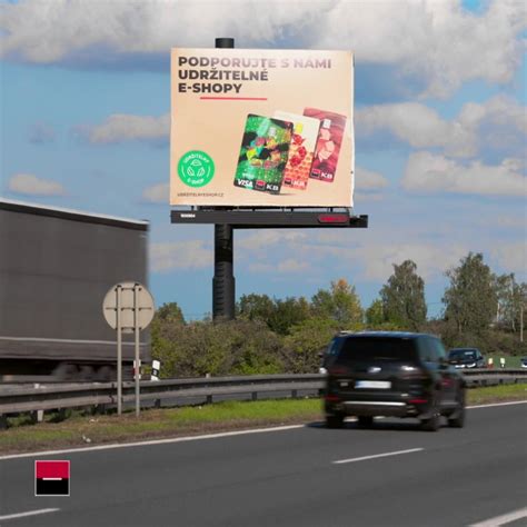 moderní komerční objekt s reklamním pylonem