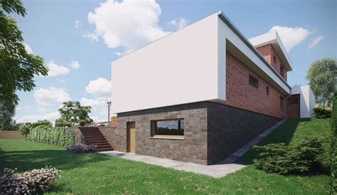 Detail cihlové fasády a bílé omítky moderního rodinného domu